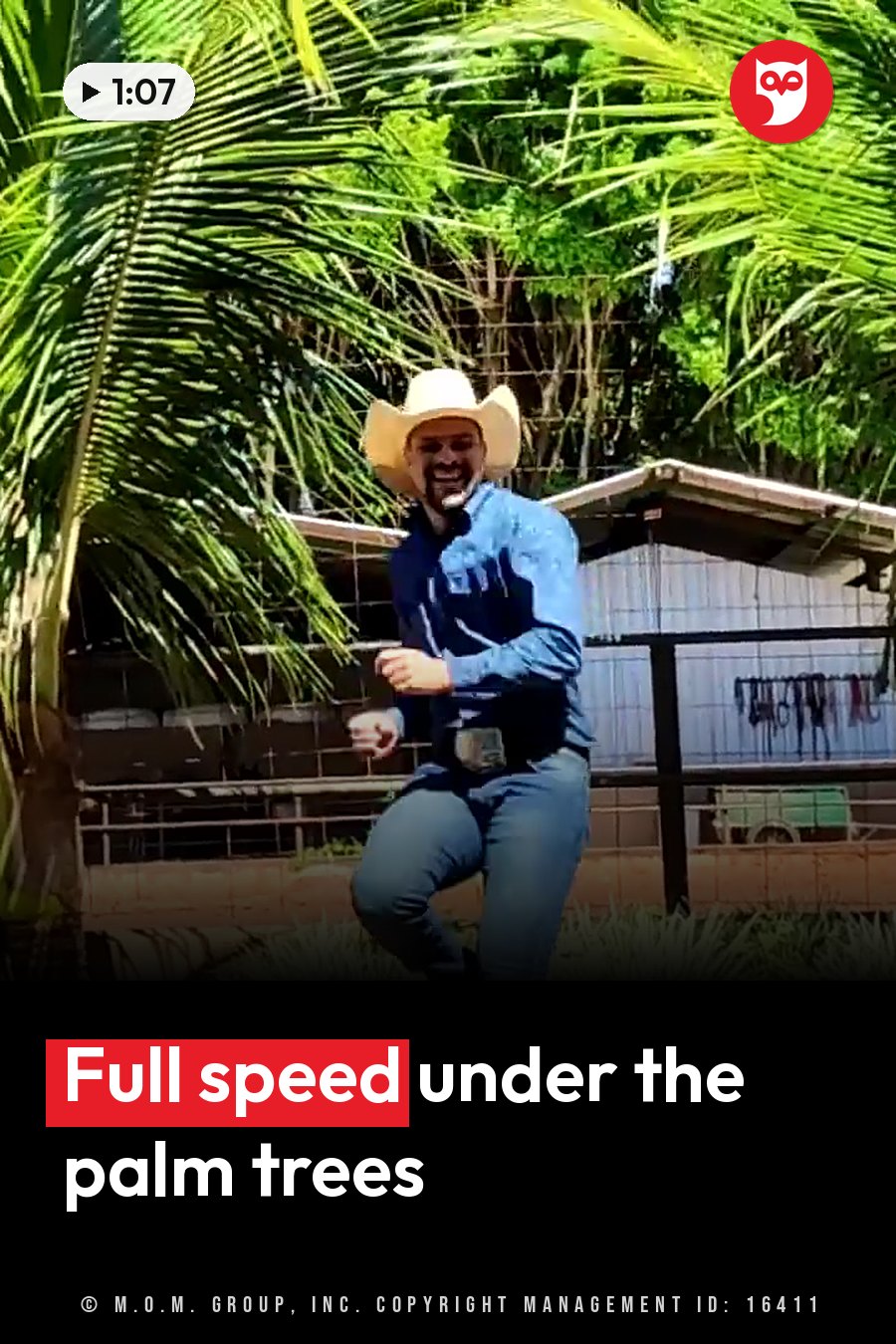 A man in a cowboy hat and blue shirt dances outdoors near palm trees and a fence. A headline runs in white letters across the lower third.