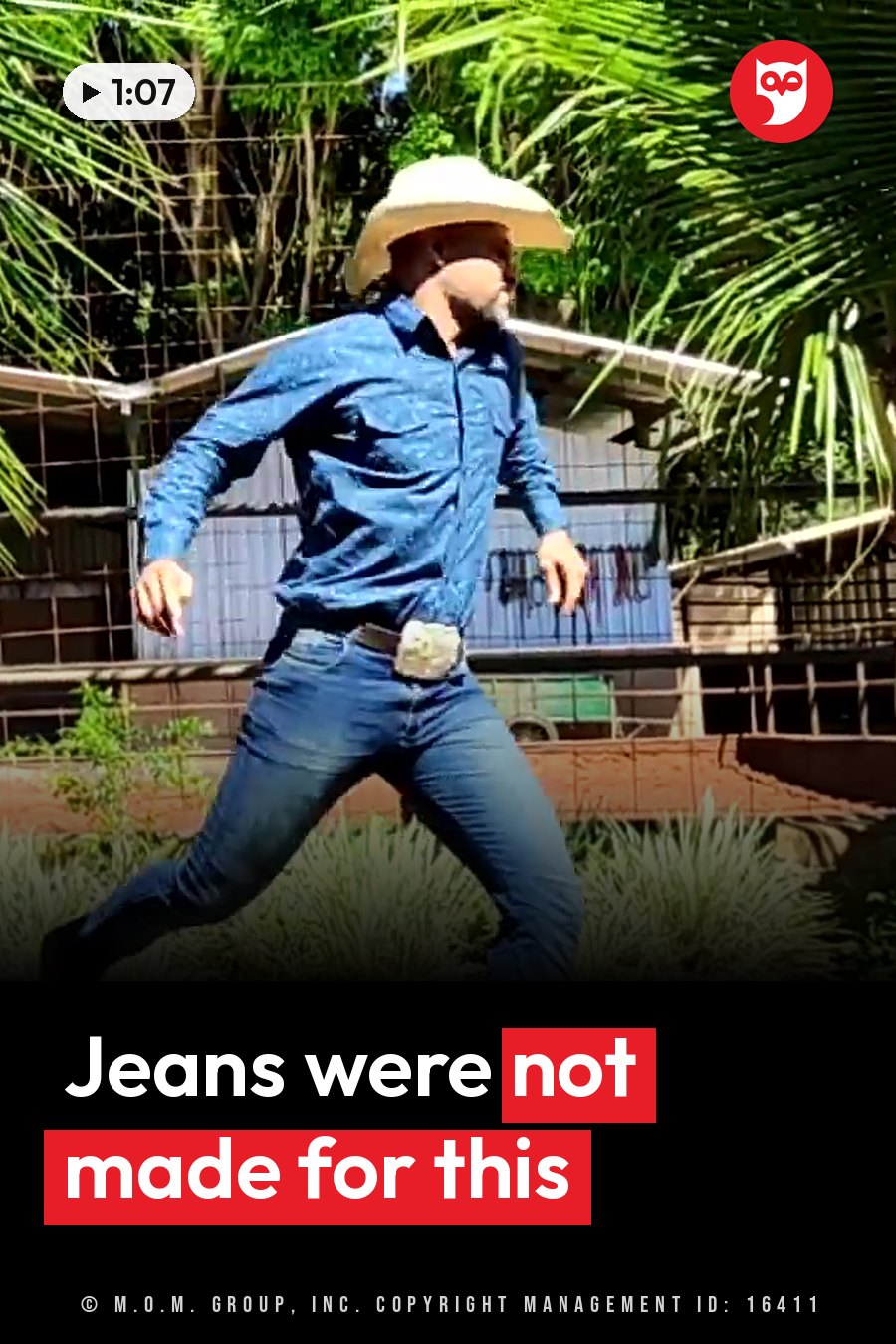 A man in a cowboy hat, blue shirt, jeans and a belt buckle dances outdoors near greenery and a fence. A headline runs in white letters across the lower third.