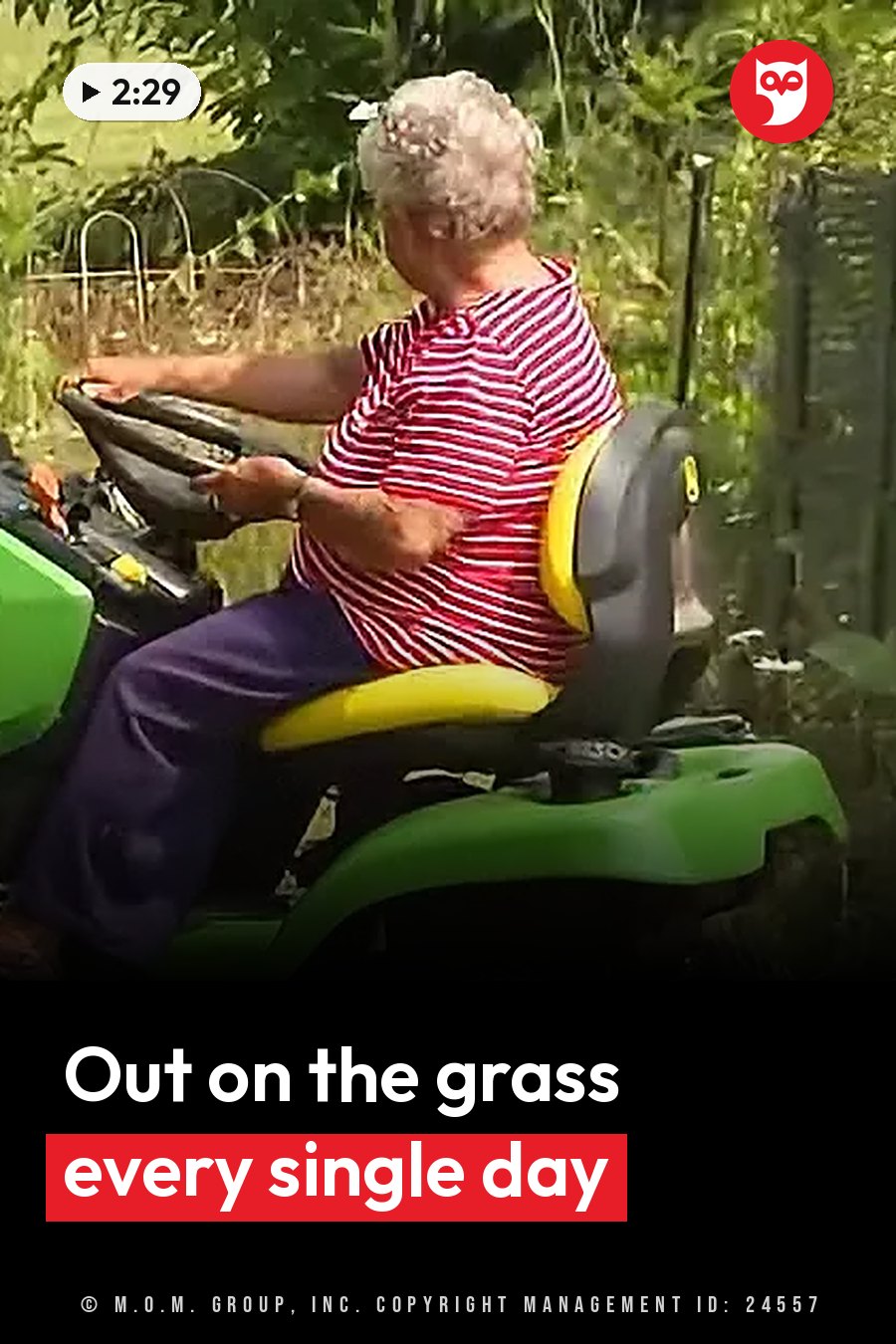 An elderly person with short gray hair drives a green riding mower through a grassy area near bushes and fencing. A headline runs in white letters across the lower third.