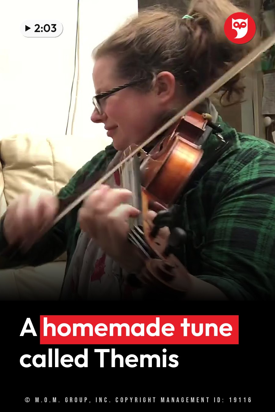 Anna Dowling, wearing glasses, sits indoors playing a violin held under her chin. A headline runs in white letters across the lower third.