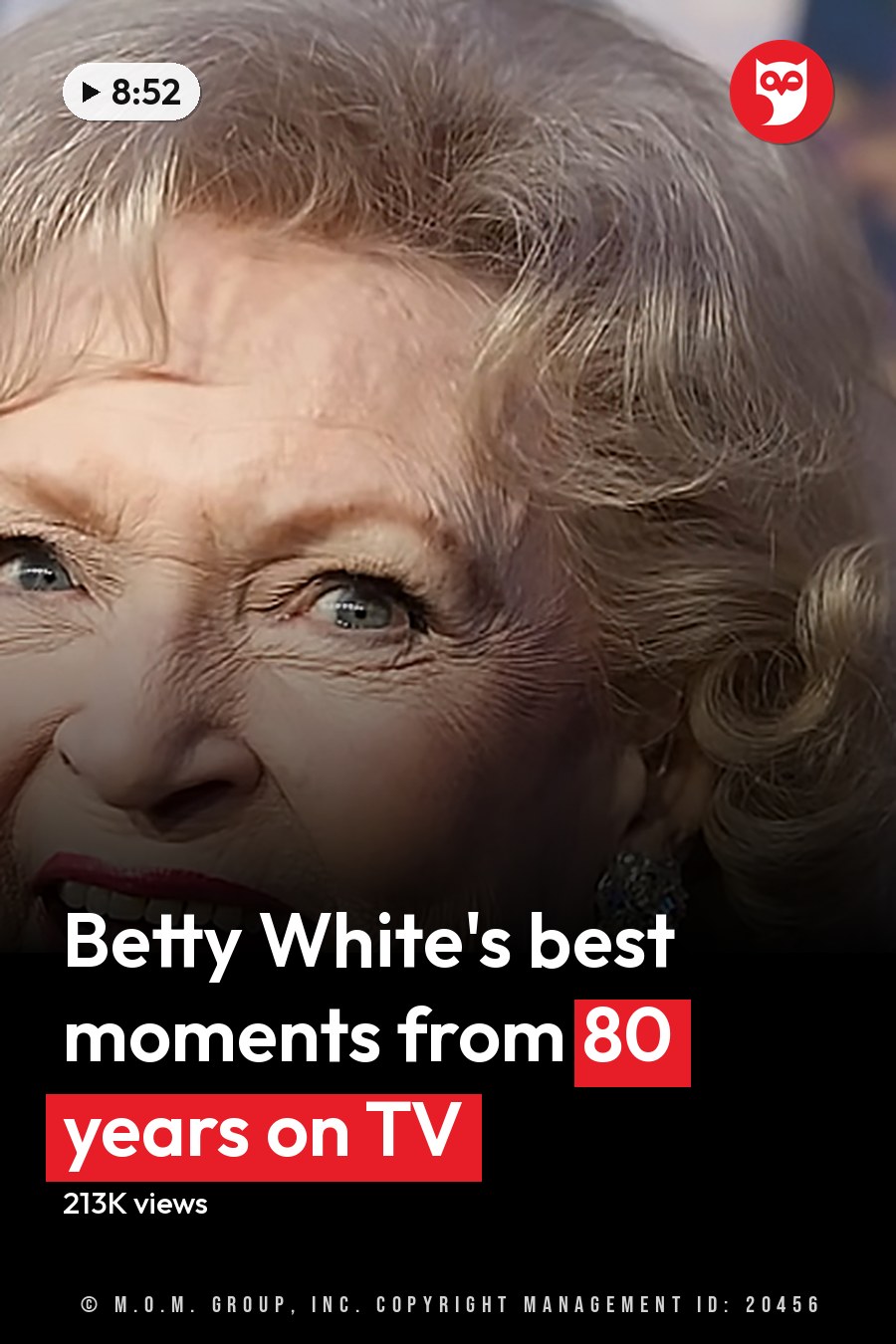 An older adult female wearing a black, form-fitting dress adorned with blue and silver sequins at what appears to be a public event or premiere. The headline runs in white letters across the lower third.