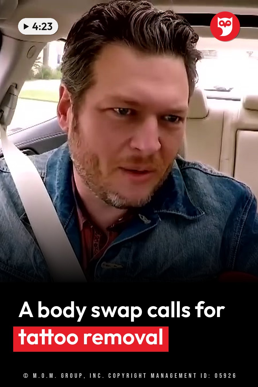 A bearded man in a denim jacket and seat belt talks while looking ahead from his car seat. A headline runs in white letters across the lower third.