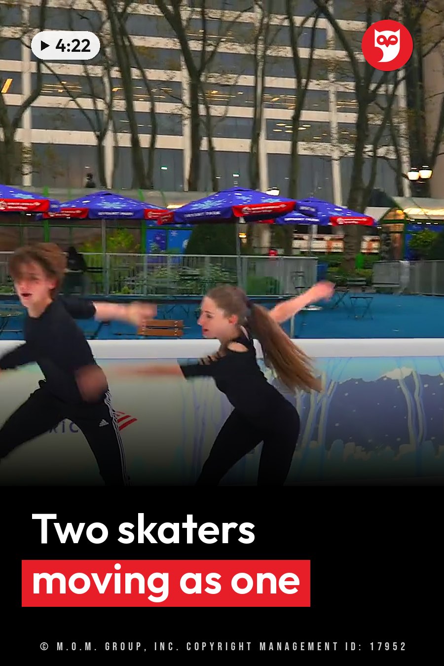 Two ice skaters with arms extended on a rink near blue umbrellas, with trees and buildings behind them. A headline runs in white letters across the lower third.