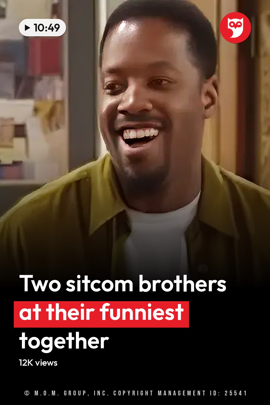 Two young adult males in casual indoor attire, one wearing a dark blue button-up shirt and the other in a mustard yellow button-down over white, surrounded by neutral-toned furniture and abstract artwork. The headline runs in white letters across the lower third.