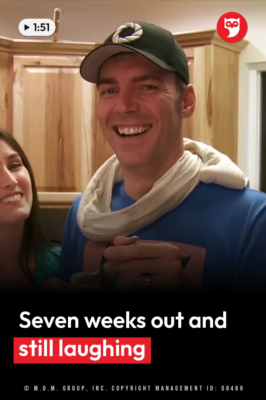 A man in a green cap and blue shirt laughs with a spoon near his mouth while a woman smiles next to him. A headline runs in white letters across the lower third.
