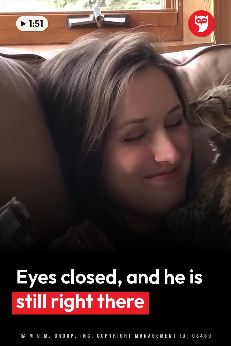 A woman rests her head on a couch with her eyes closed and a slight smile while a cat lies curled up beside her. A headline runs in white letters across the lower third.