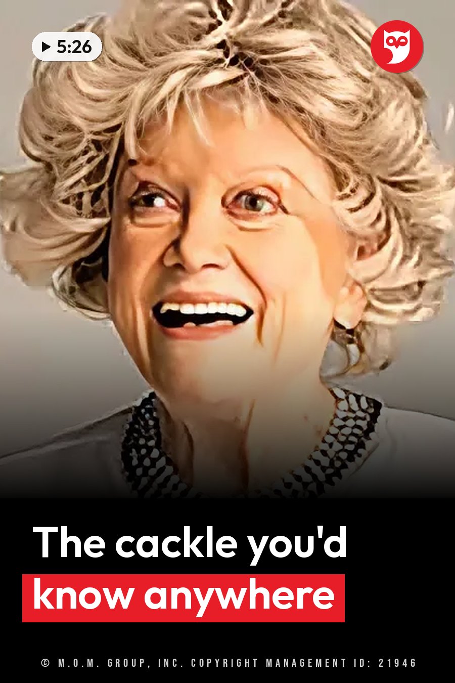 An older woman with curly blonde hair smiles widely, wearing a white top with a black patterned collar. A headline runs in white letters across the lower third.