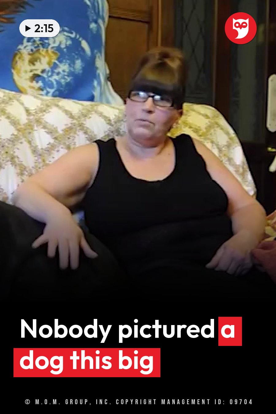 A woman with glasses and a black sleeveless top sits on a patterned couch, looking ahead. A headline runs in white letters across the lower third.