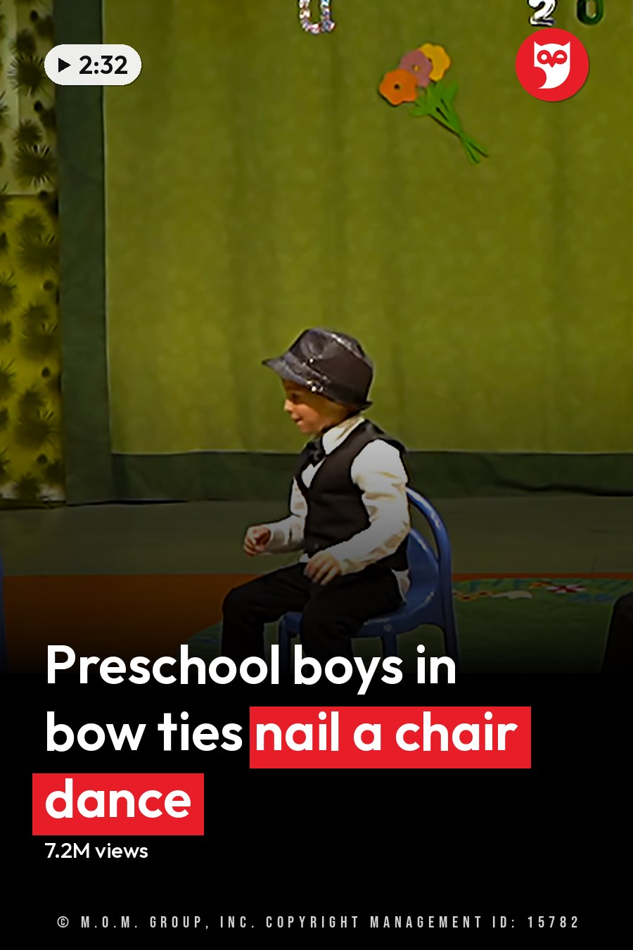Children in a school setting, performing with formal attire on a stage decorated for spring or summer. The headline runs in white letters across the lower third.