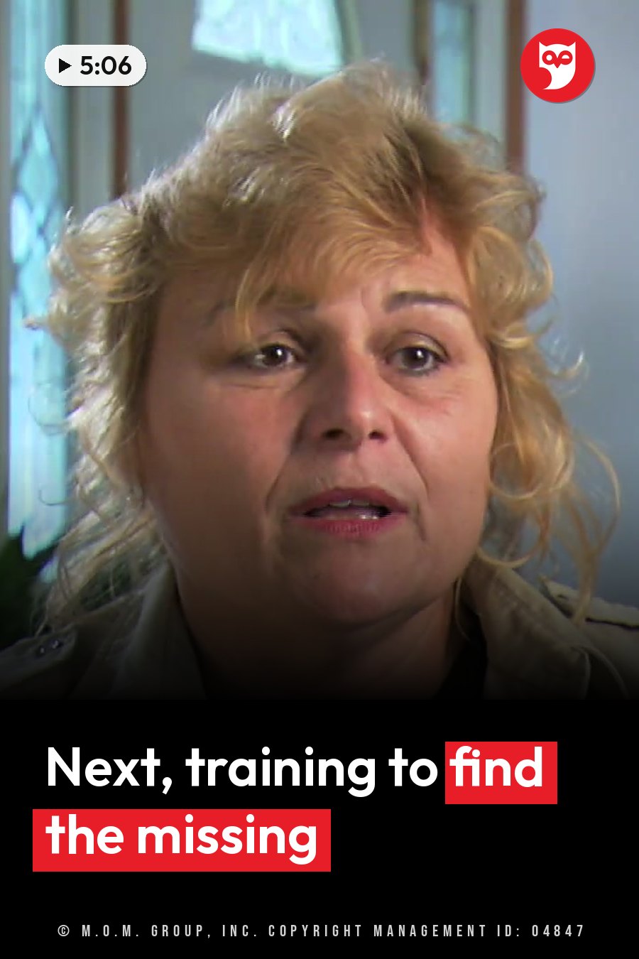 A woman with curly blonde hair speaks indoors near a window with stained glass. A headline runs in white letters across the lower third.
