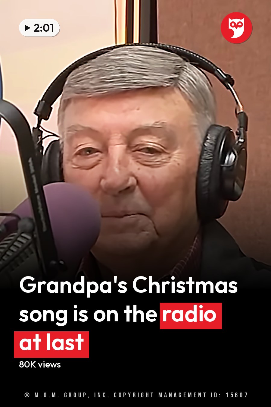An older adult male wearing a dark gray jacket over a red and white checkered shirt, with large black over-ear headphones, sits in front of a microphone at '104.1 KRBE' radio station. The headline runs in white letters across the lower third.