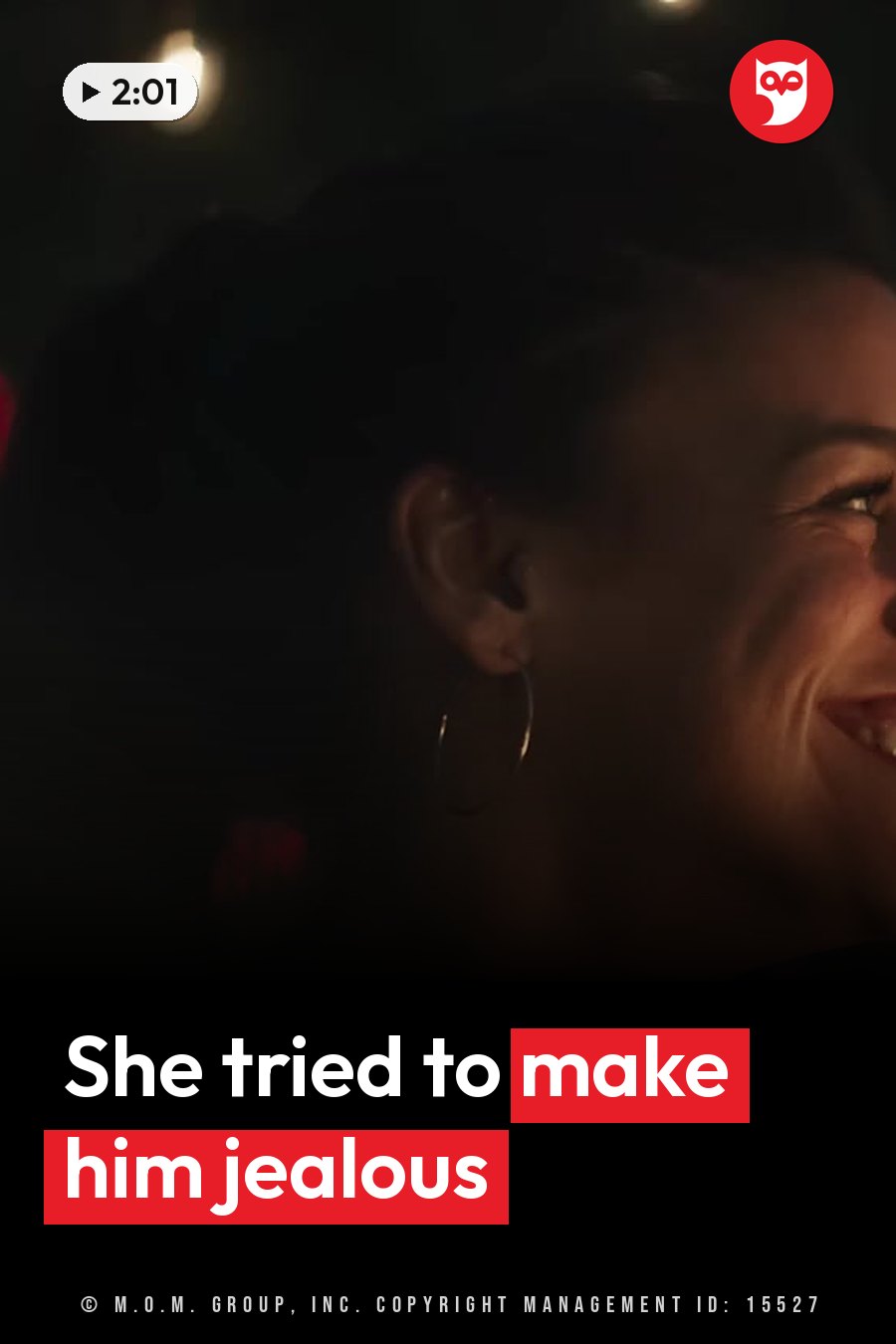 A smiling woman with large hoop earrings, lit by soft lights against a dark background. A headline runs in white letters across the lower third.