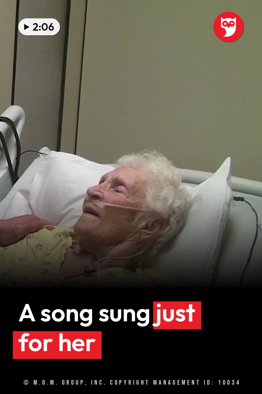 An older person lies in a hospital bed in a yellow gown, with an oxygen tube near the nose. A headline runs in white letters across the lower third.