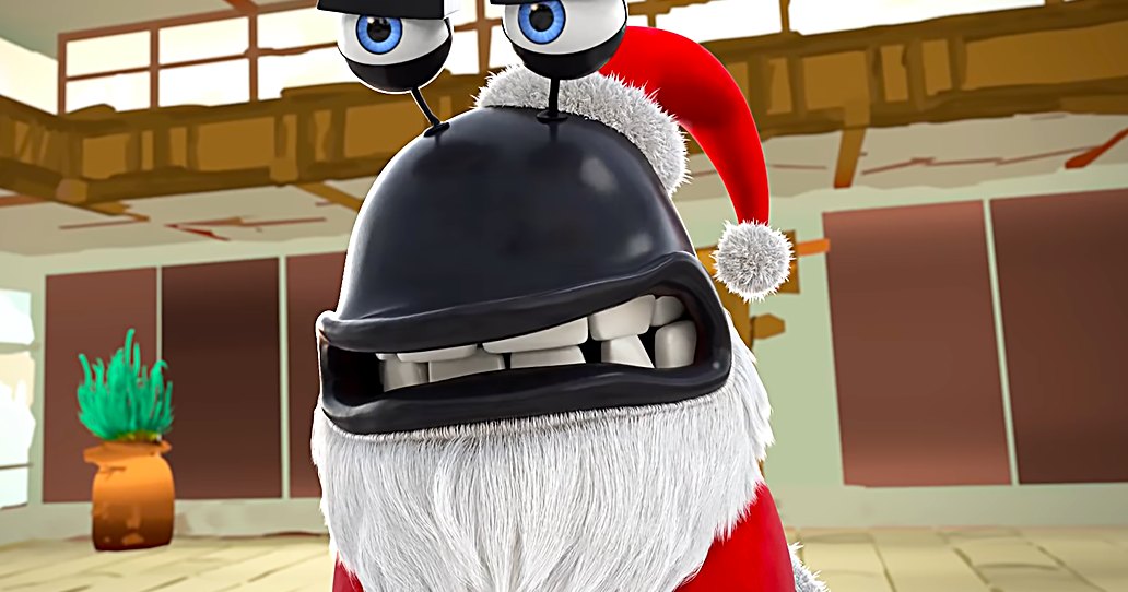 A festive, adult-sized robot with a large mouth and Santa hat in an indoor setting with natural light and wooden beams.