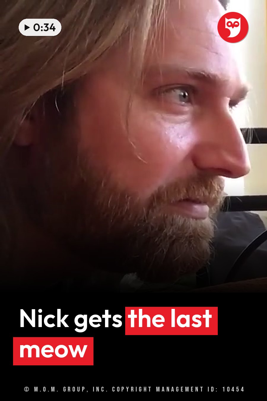 Nick, a man with long hair and a beard, looks to one side with his mouth slightly open, indoors beside a dark object. A headline runs in white letters across the lower third.