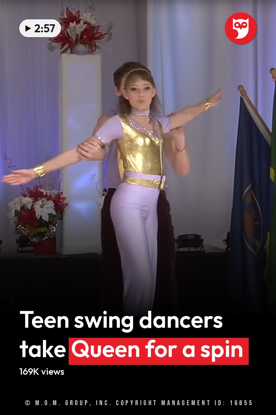A young adult female dancer wearing a gold leotard and white pants, performing at an 'US Open' dance competition with flags from various countries in the background. The headline runs in white letters across the lower third.