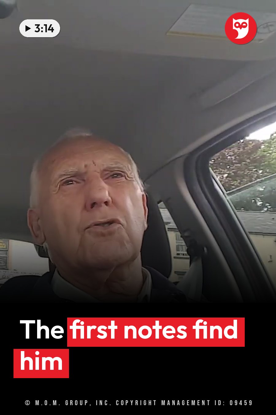 An older man sits in a car, looking forward with his mouth slightly open. A headline runs in white letters across the lower third.