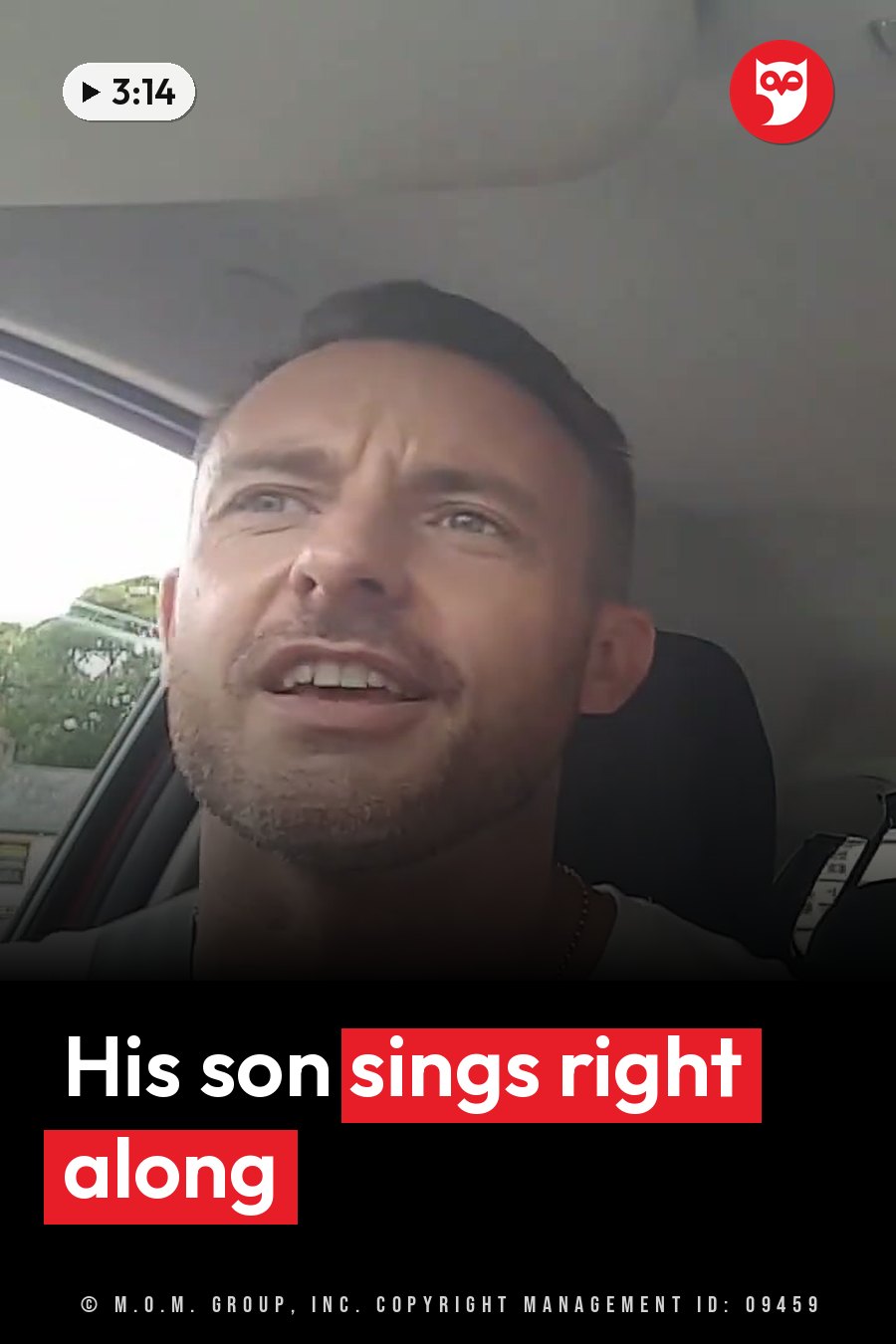 A man with short hair and stubble sits in a car, looking upward while speaking. A headline runs in white letters across the lower third.