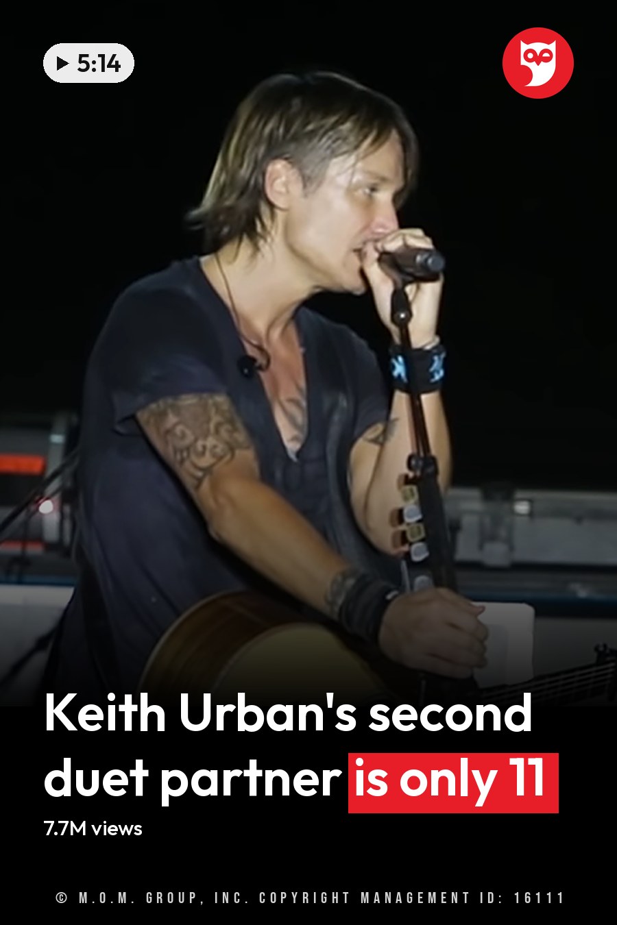 A young adult male singer wearing a dark t-shirt with a tattoo, holding a guitar, and a young adult female performer in a patterned dress with jewelry and bracelet, performing on stage at an indoor venue under artificial lighting. The headline runs in white letters across the lower third.