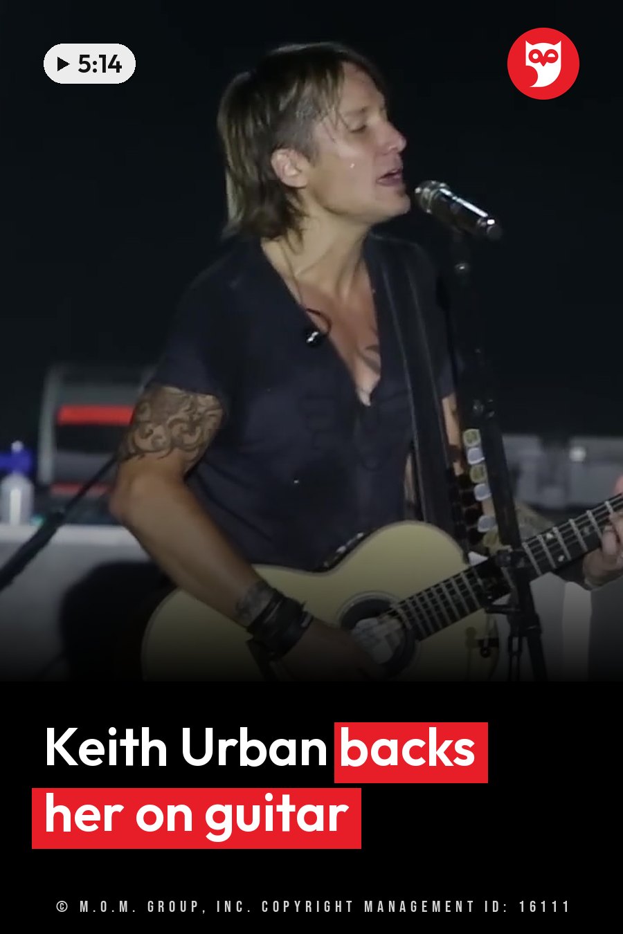 Keith Urban, his tattoos showing, plays an acoustic guitar and sings into a microphone on a stage at night. A headline runs in white letters across the lower third.