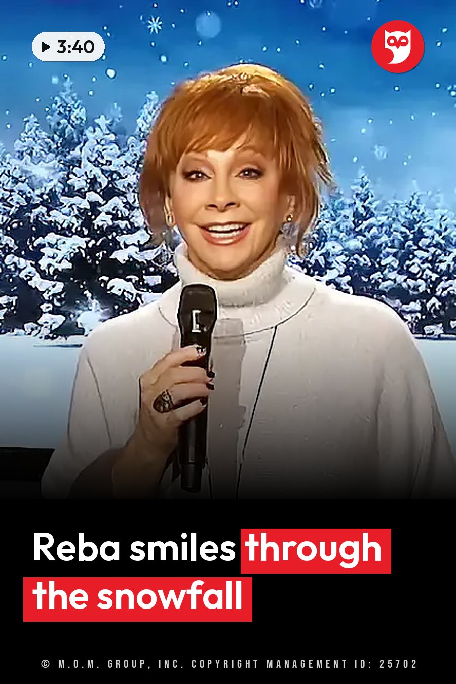 A woman with red hair smiles and holds a microphone as snowflakes fall in front of a snowy forest. A headline runs in white letters across the lower third.