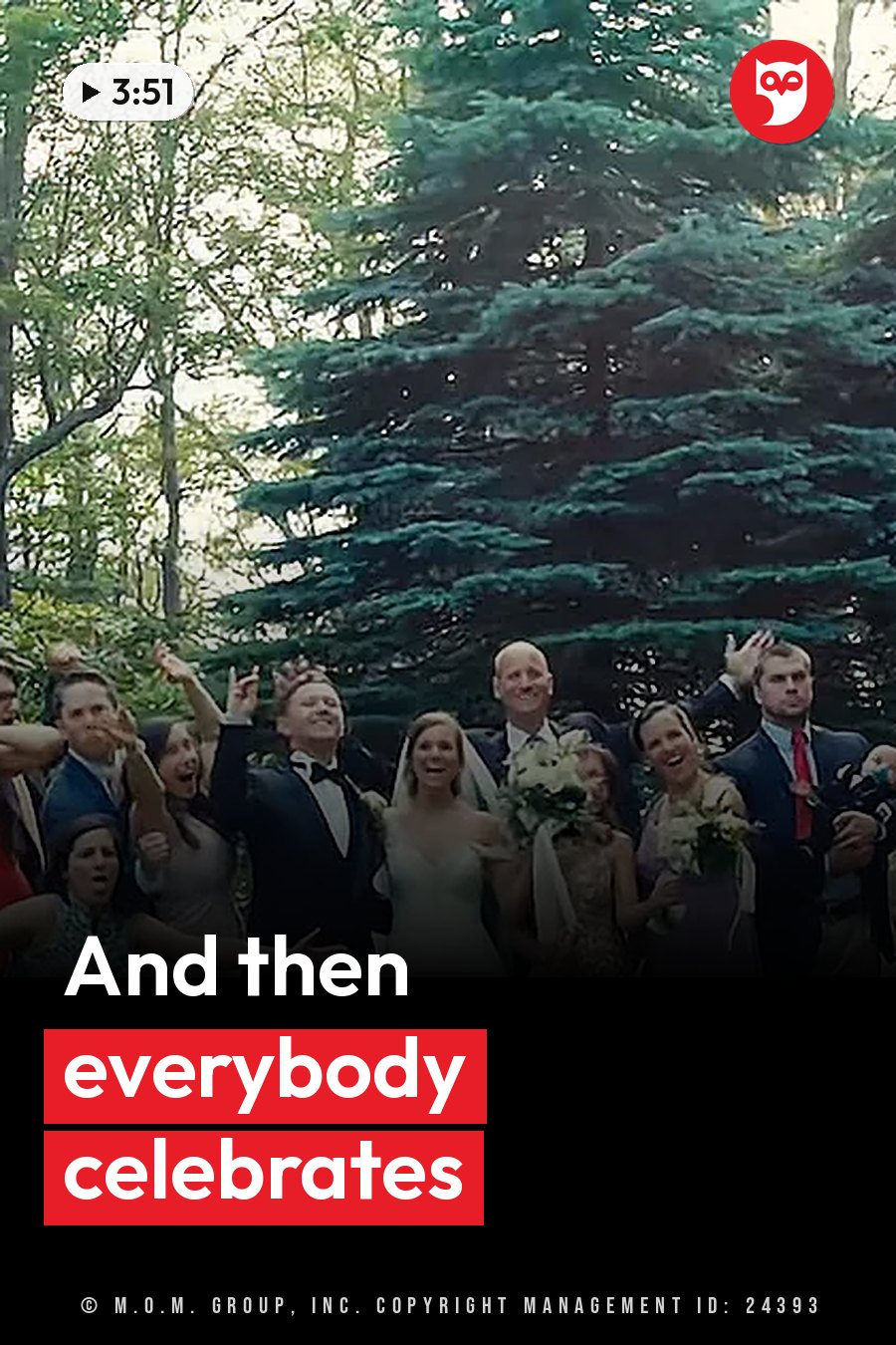 A group of people celebrate outdoors near large evergreen trees, some with their hands raised and waving. A headline runs in white letters across the lower third.