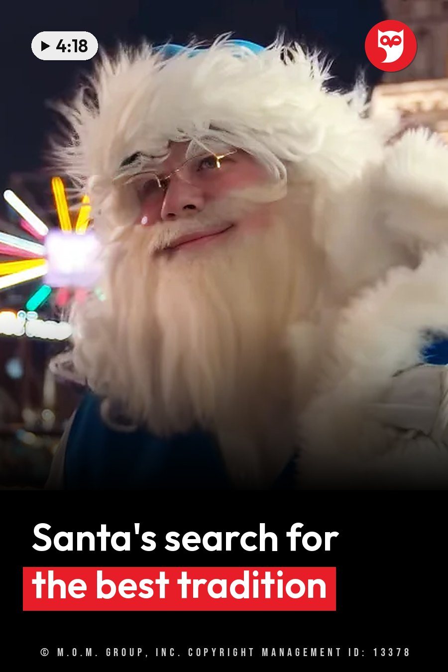A person dressed as Santa Claus, with a white beard and glasses, smiles and waves at the camera. A headline runs in white letters across the lower third.