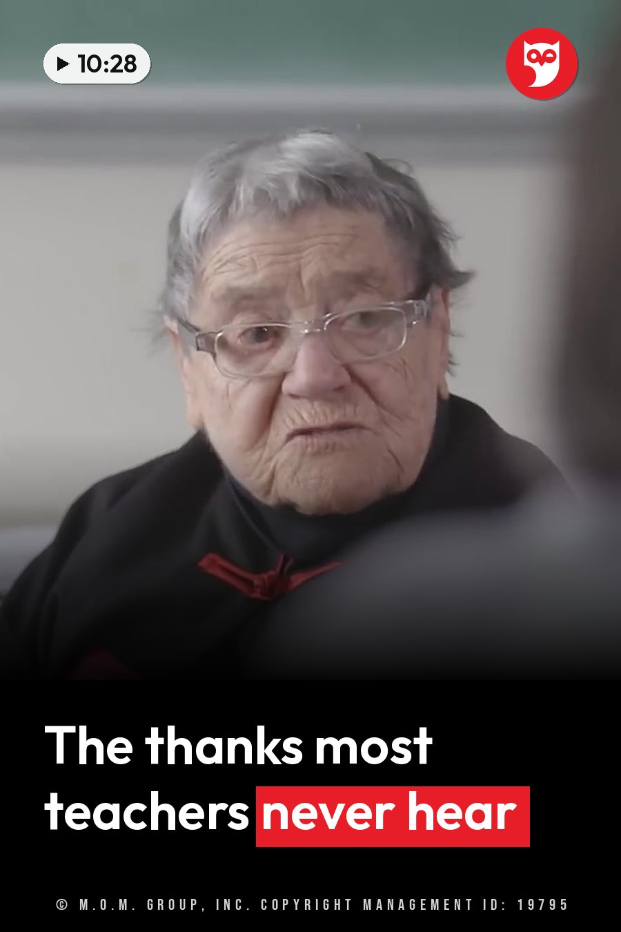 An older woman with glasses and gray hair sits in a black top with red accents, looking ahead. A headline runs in white letters across the lower third.