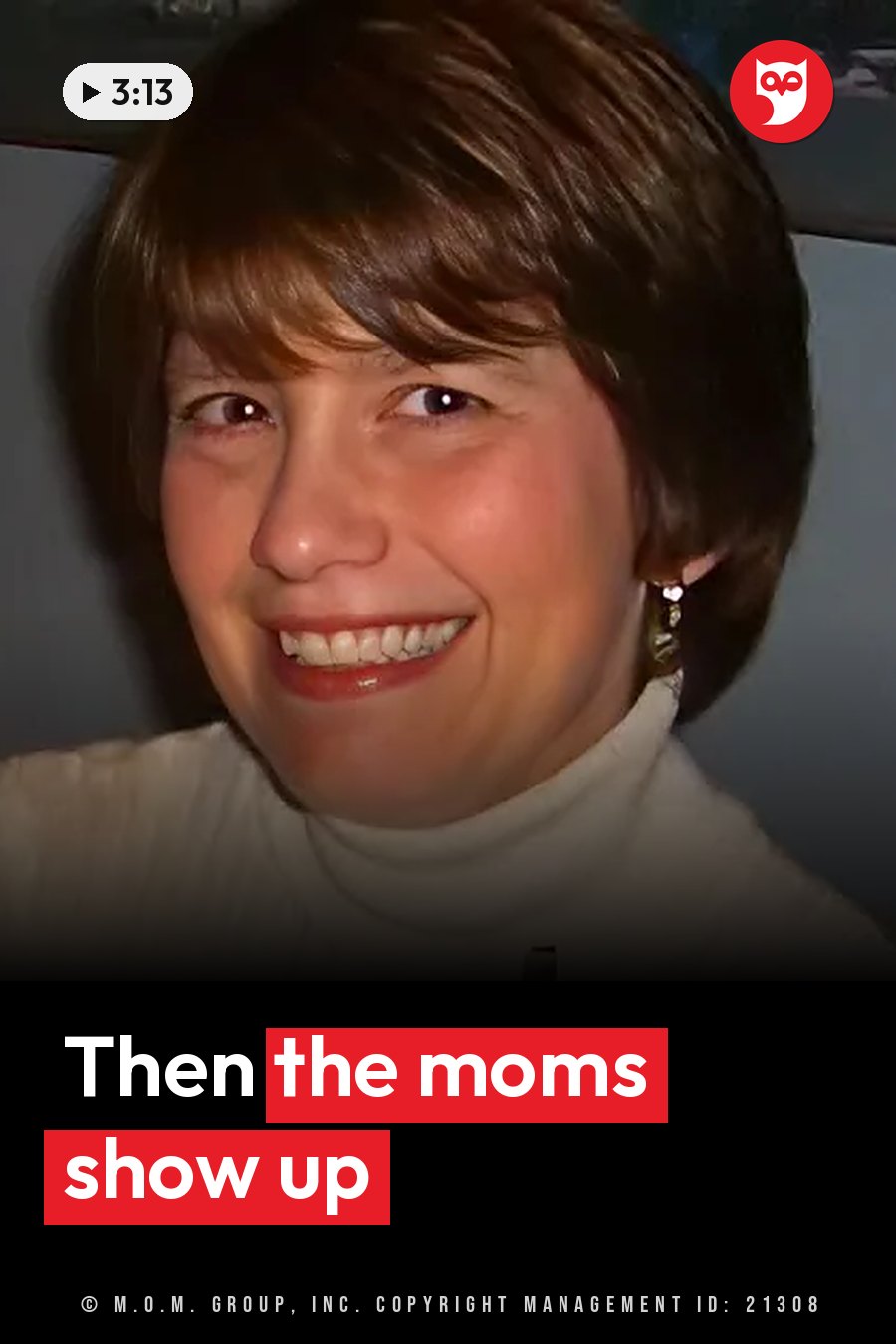 A woman with short brown hair smiles, wearing a white turtleneck sweater and dangling earrings. A headline runs in white letters across the lower third.