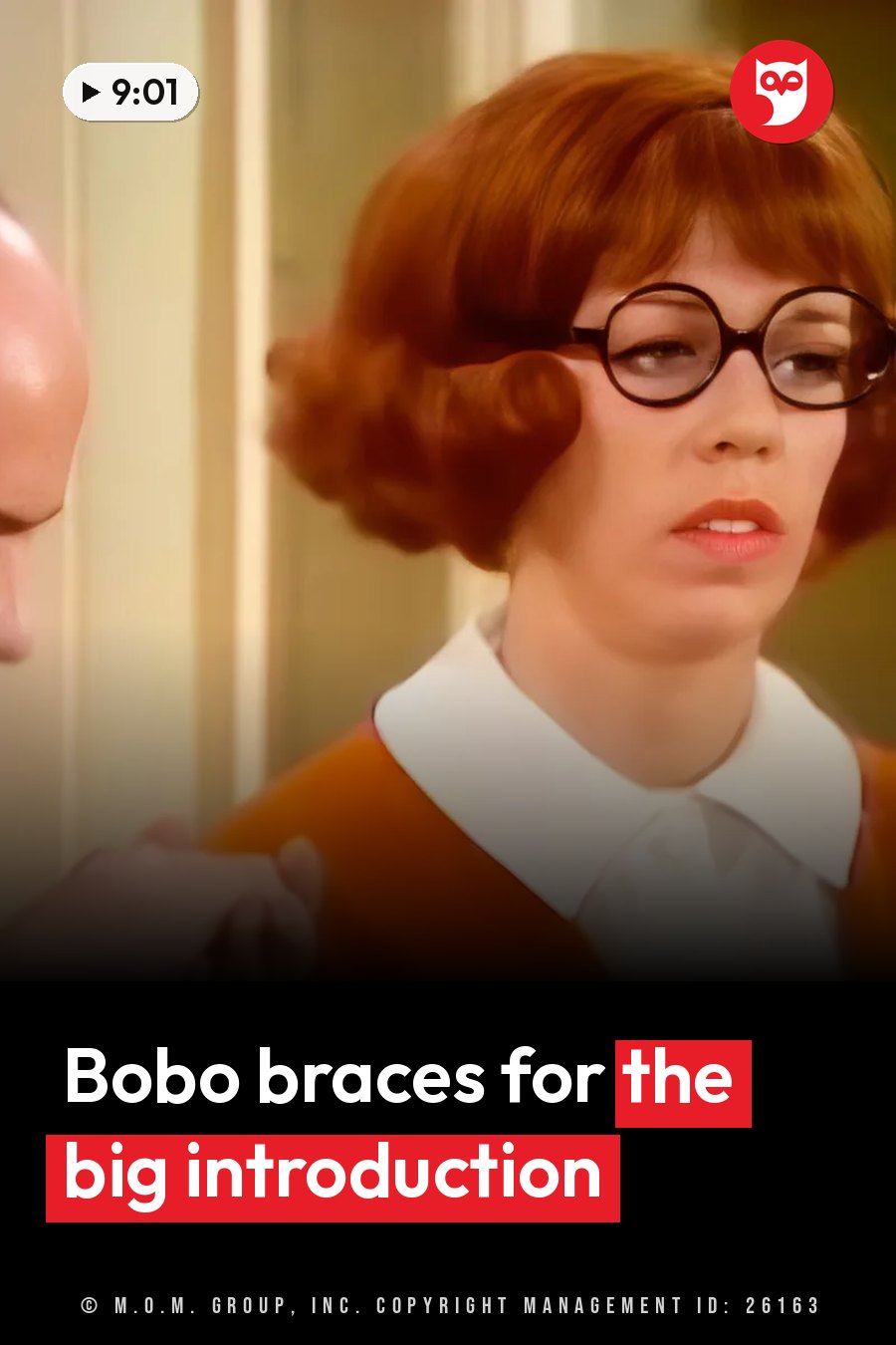 Carol Burnett as Bobo, with red hair, glasses and an orange top, looks ahead while a hand rests on her shoulder. A headline runs in white letters across the lower third.