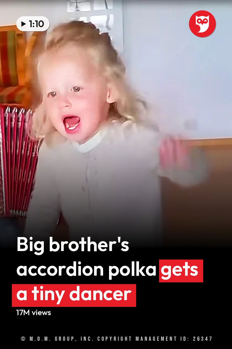 Two toddlers, a boy and girl, dressed casually indoors, holding an accordion. The headline runs in white letters across the lower third.
