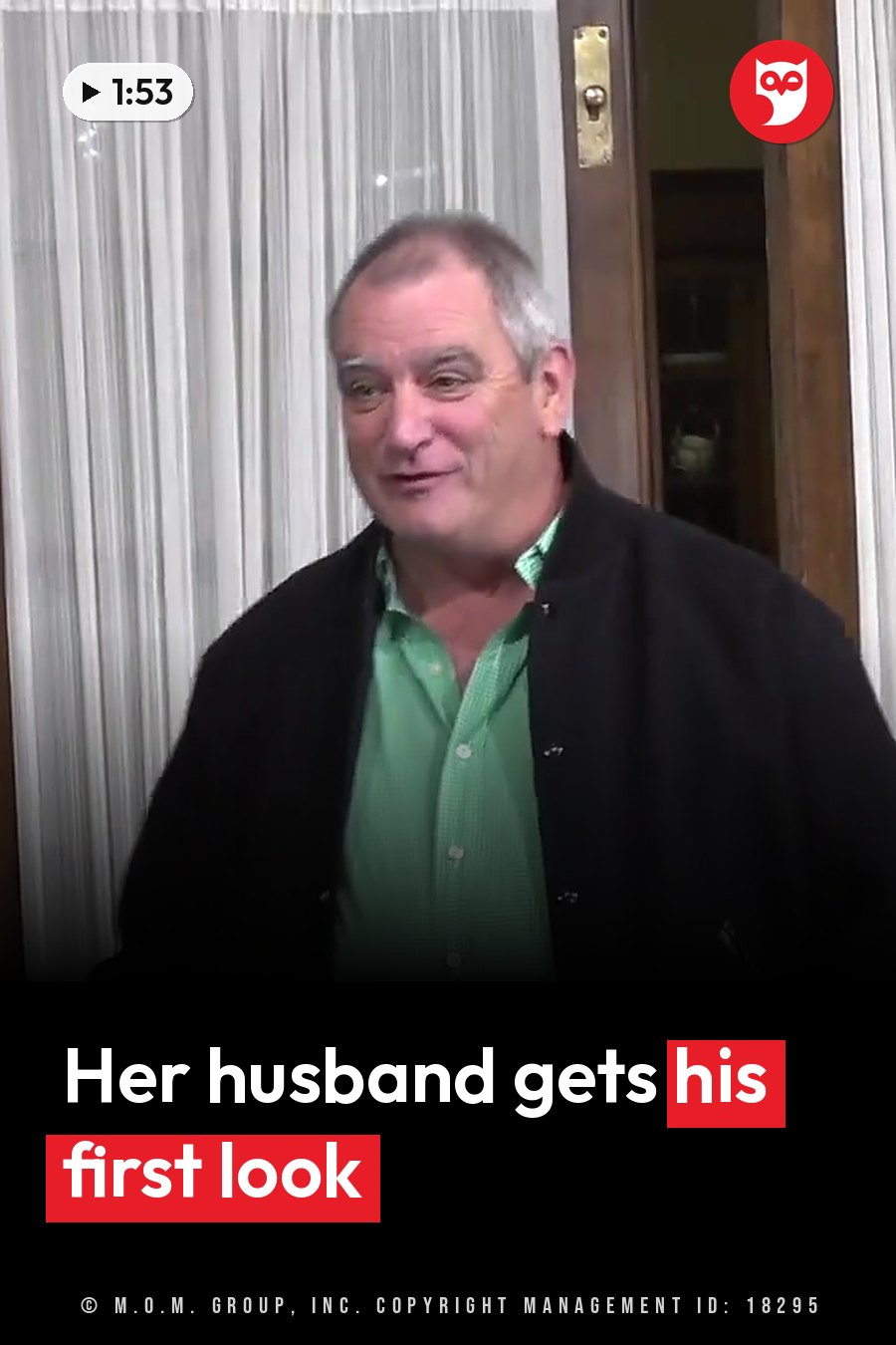 A man with gray hair wears a green shirt under a black jacket, standing indoors near a door with curtains. A headline runs in white letters across the lower third.