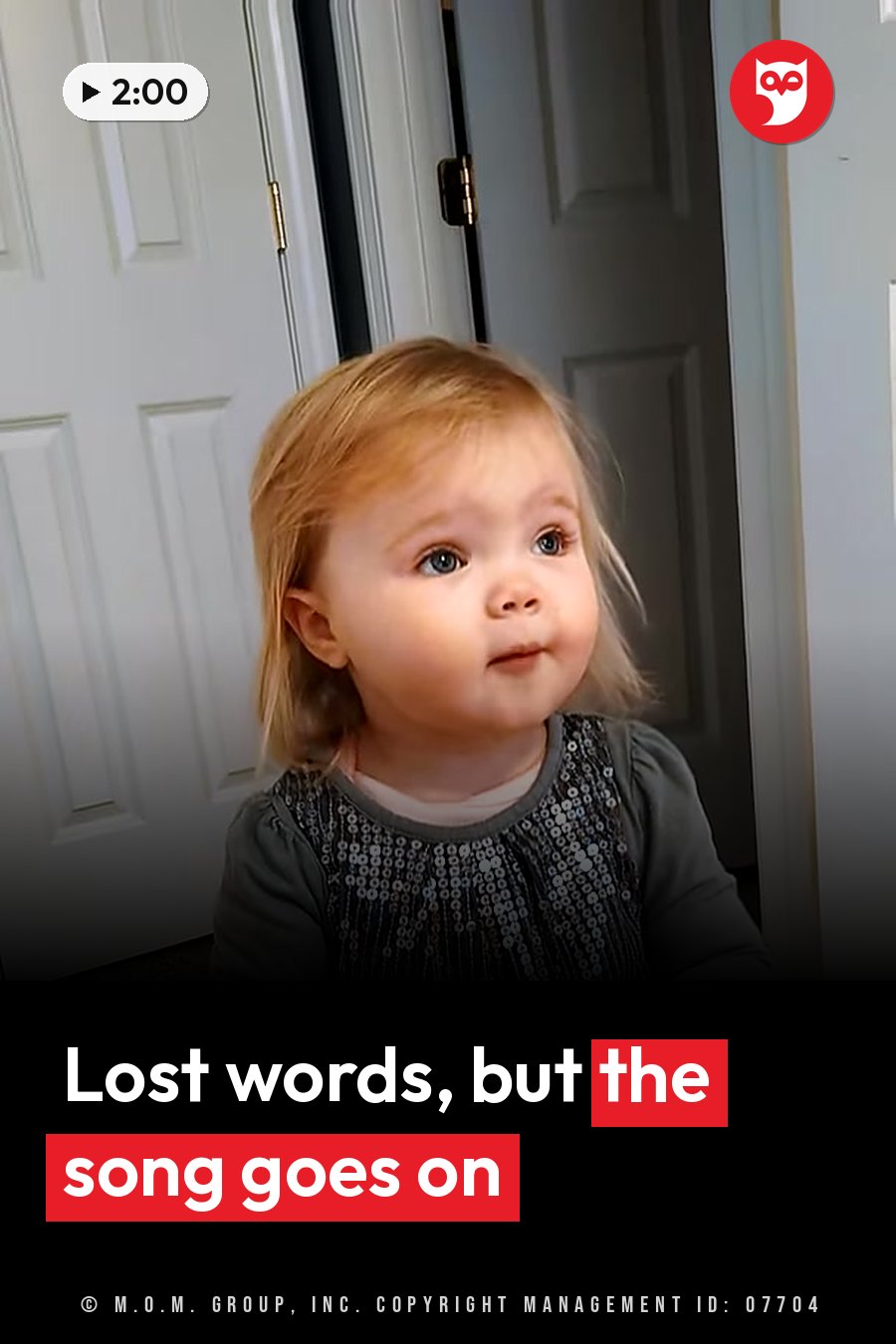 A young child with light hair and blue eyes looks upward, wearing a sequined top, near a white door. A headline runs in white letters across the lower third.