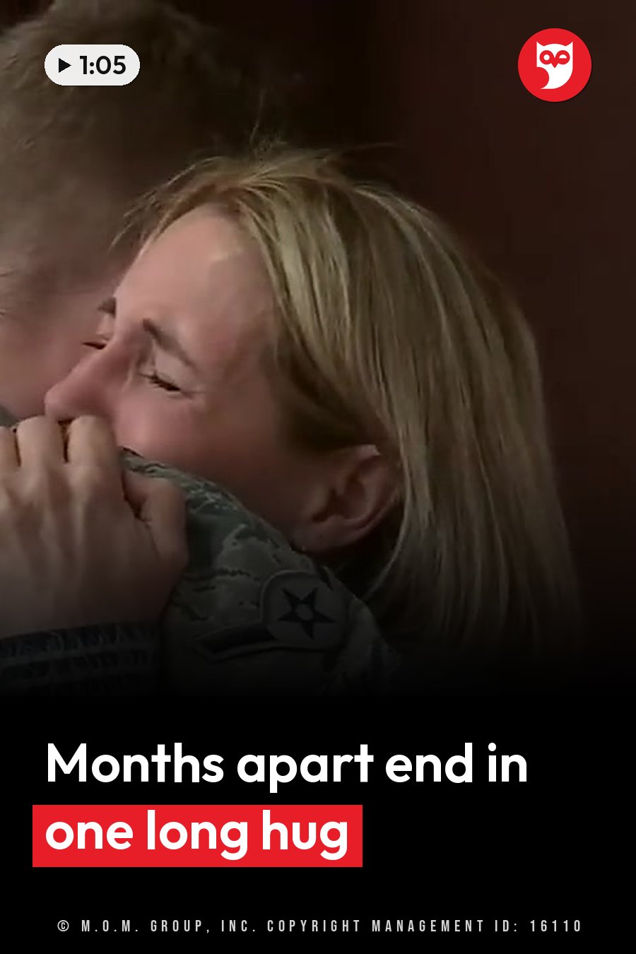 A person in a military uniform hugs another person tightly with eyes closed. A headline runs in white letters across the lower third.