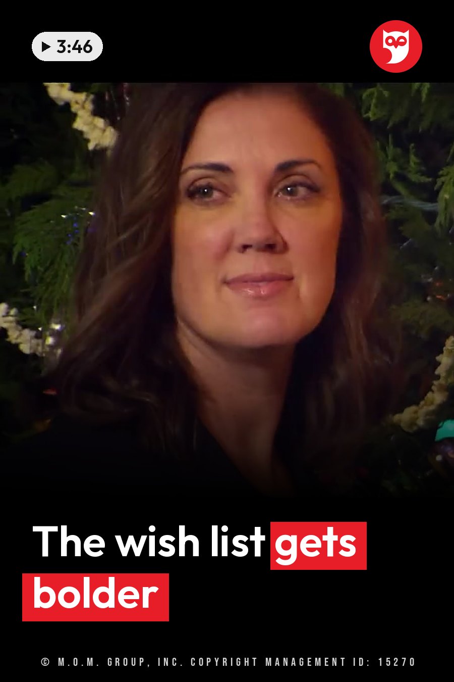 A woman with dark hair in a black top looks ahead, with greenery and white flowers behind her. A headline runs in white letters across the lower third.